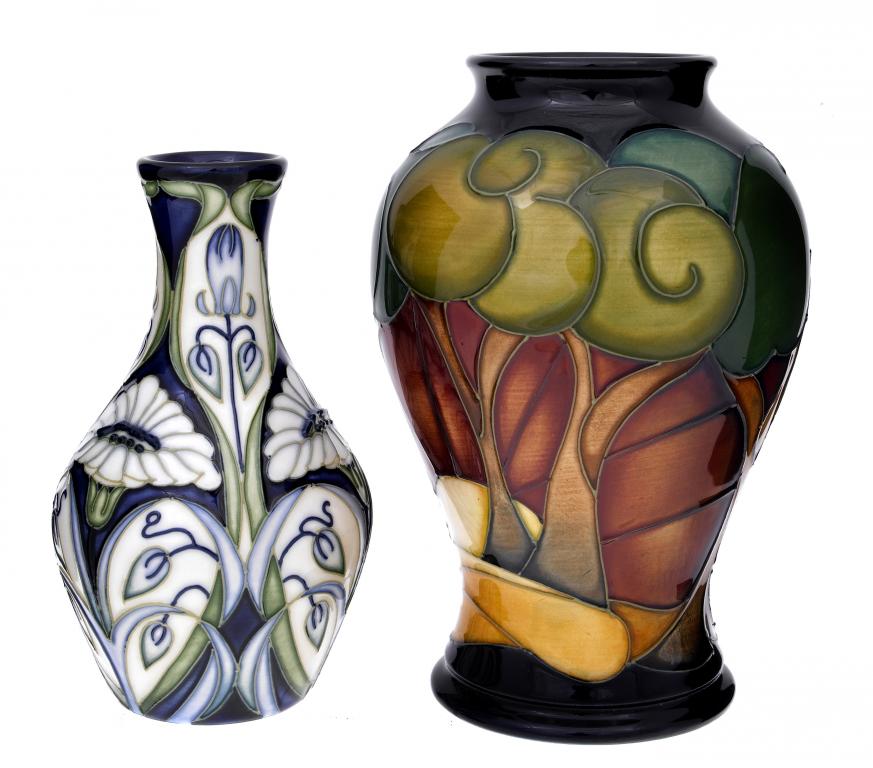 Appraisal: A MOORCROFT BOLDERWOOD VASE AND A MOORCROFT RAIN DAISY VASE