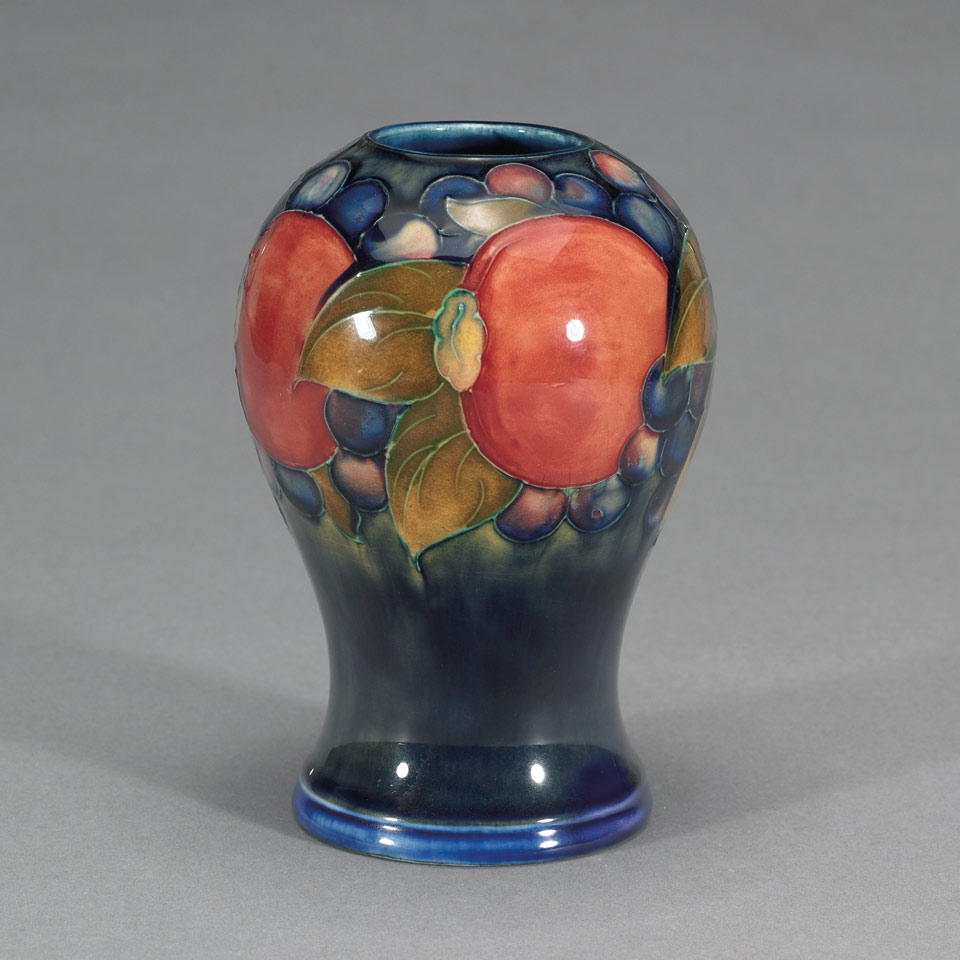 Appraisal: Moorcroft Pomegranate Vase s impressed marks including facsimile signature and