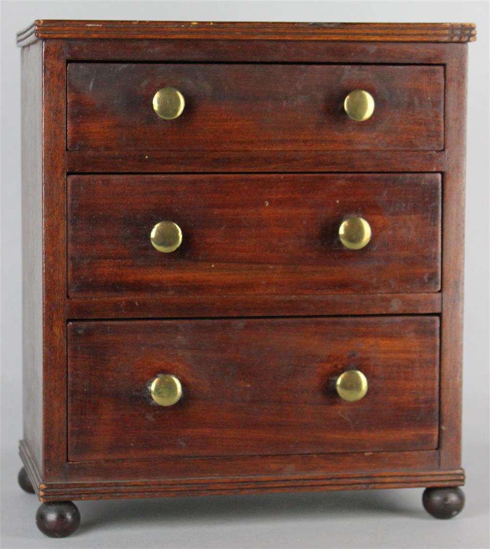 Appraisal: AN AMERICAN MAHOGANY MINIATURE CHEST OF DRAWERS second half th