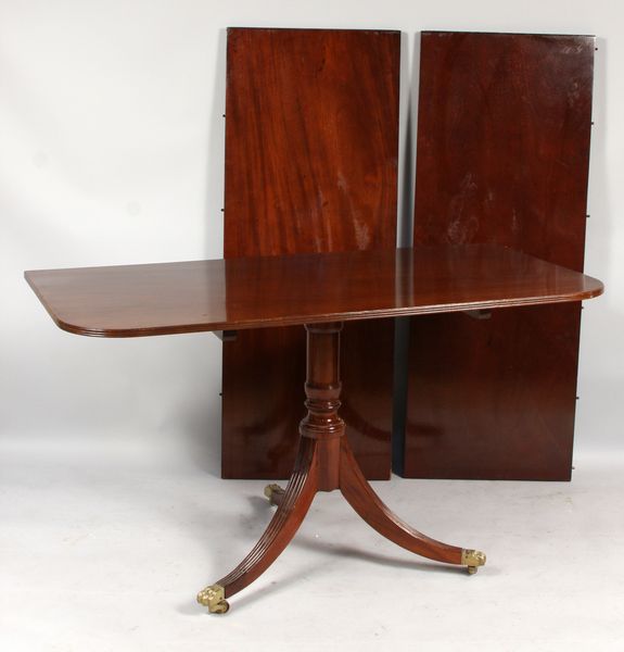 Appraisal: Regency triple pedestal mahogany dining table h x l with