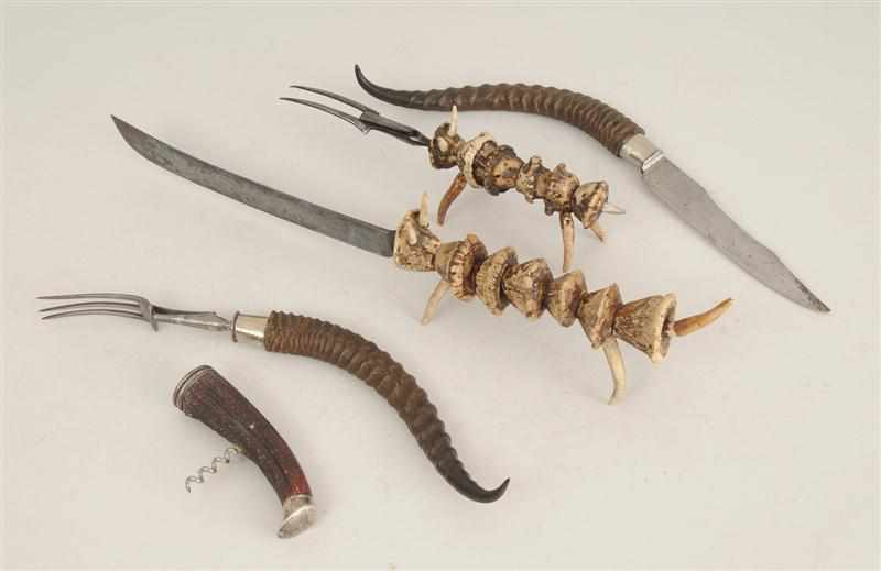 Appraisal: TWO PAIRS OF HORN-HANDLED CARVING SETS AND A STAG'S HORN