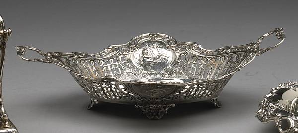 Appraisal: A continental silver reticulated basketWith pseudo hallmarks circa Monogrammed AMM