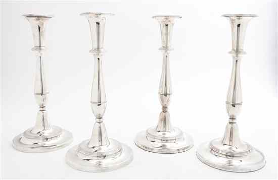 Appraisal: A Set of Four Sheffield Plate Candlesticks likely Matthew Boulton