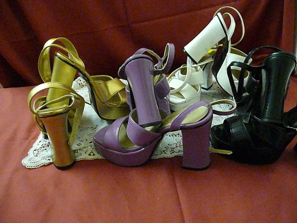 Appraisal: A group of 's style ankle strap ladies shoes in