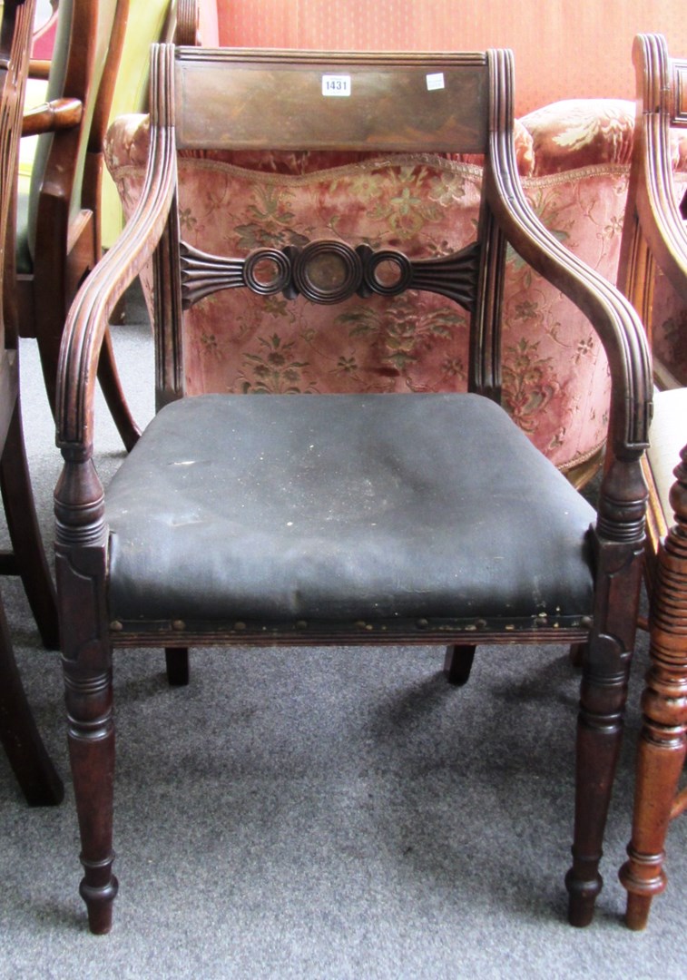 Appraisal: An early th century mahogany carver chair with bulls eye