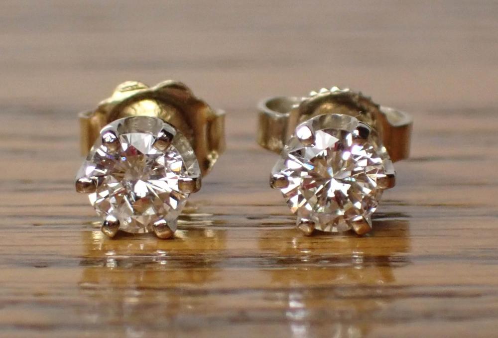 Appraisal: PAIR OF DIAMOND AND FOURTEEN KARAT GOLD EAR STUDS each