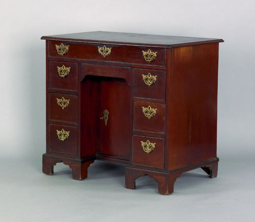 Appraisal: George III mahogany kneehole desk ca with one long and