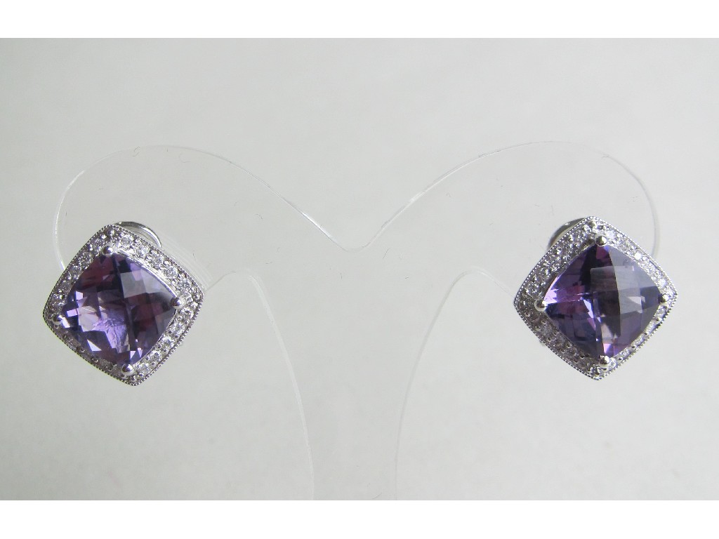 Appraisal: Eighteen carat white gold amethyst and diamond cluster stud earrings