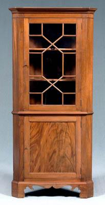 Appraisal: Chippendale style corner cupboard narrow form one-case construction walnut and