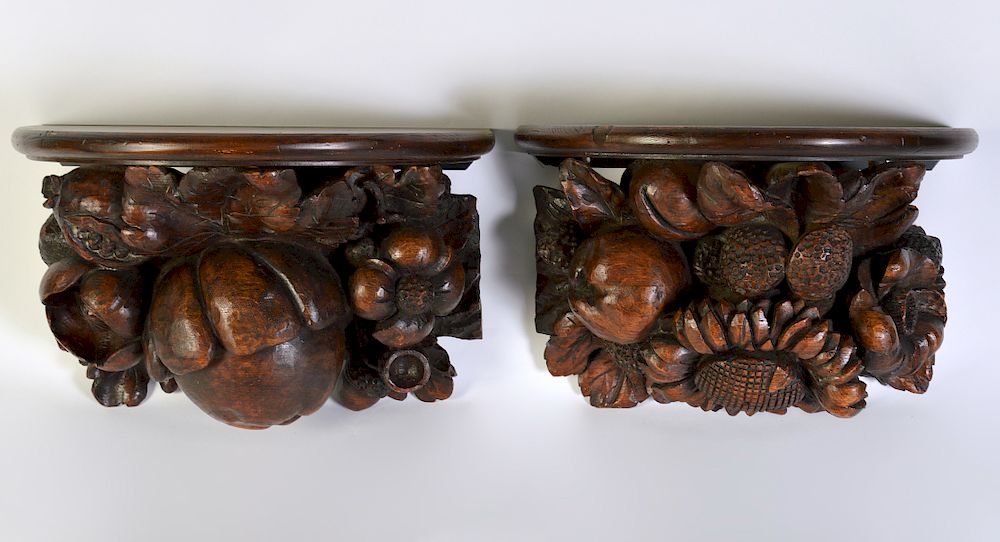 Appraisal: Pr Carved Dark Wood Brackets with Fruit Acorns Pair of