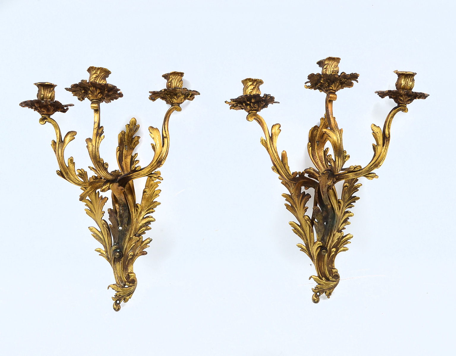 Appraisal: PAIR ITALIAN GILDED BRONZE LIGHT SCONCES Gilt cast bronze Italian