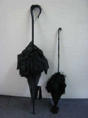 Appraisal: A Victorian lady's black satin mourning parasol with wide lace