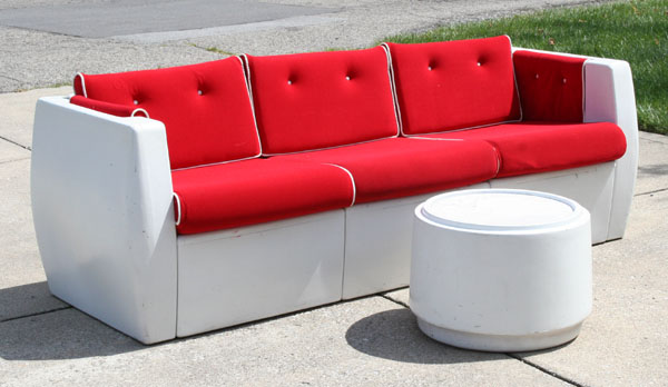 Appraisal: Vintage Retro Mod fiberglass sofa with matching side table Red