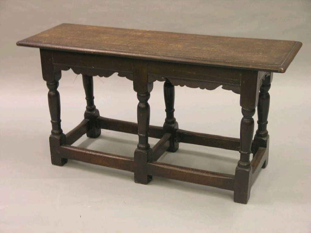 Appraisal: A good quality early th century dark oak joint stool