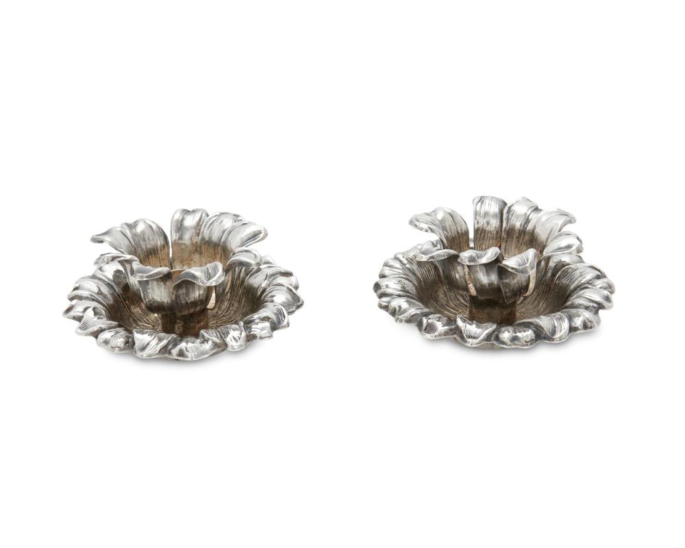 Appraisal: A pair of Tiffany Co sterling silver flower candleholders th