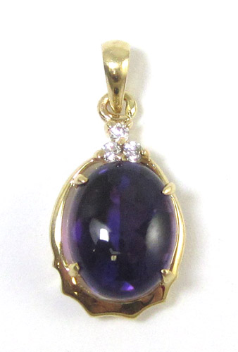 Appraisal: AMETHYST DIAMOND AND YELLOW GOLD PENDANT The k gold pendant