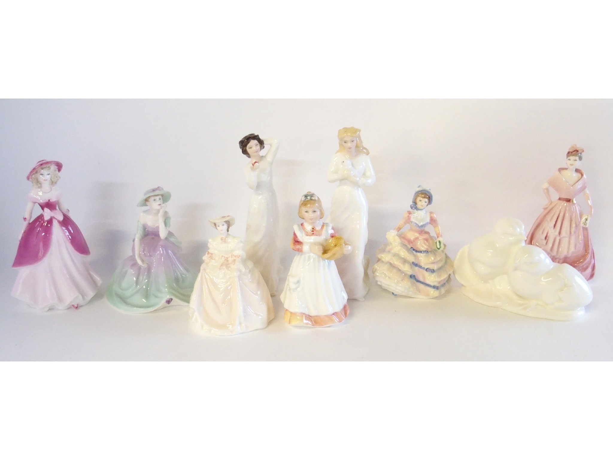 Appraisal: Five Royal Doulton and four Coalport figures to include 'Loving