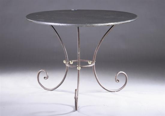 Appraisal: FRENCH PROVINCIAL STEEL GUERIDON th century Sheet-metal wrapped top over