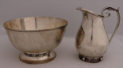 Appraisal: INTERNATIONAL SILVER WATER PITCHER AND MATCHING FRUIT BOWL Designed by