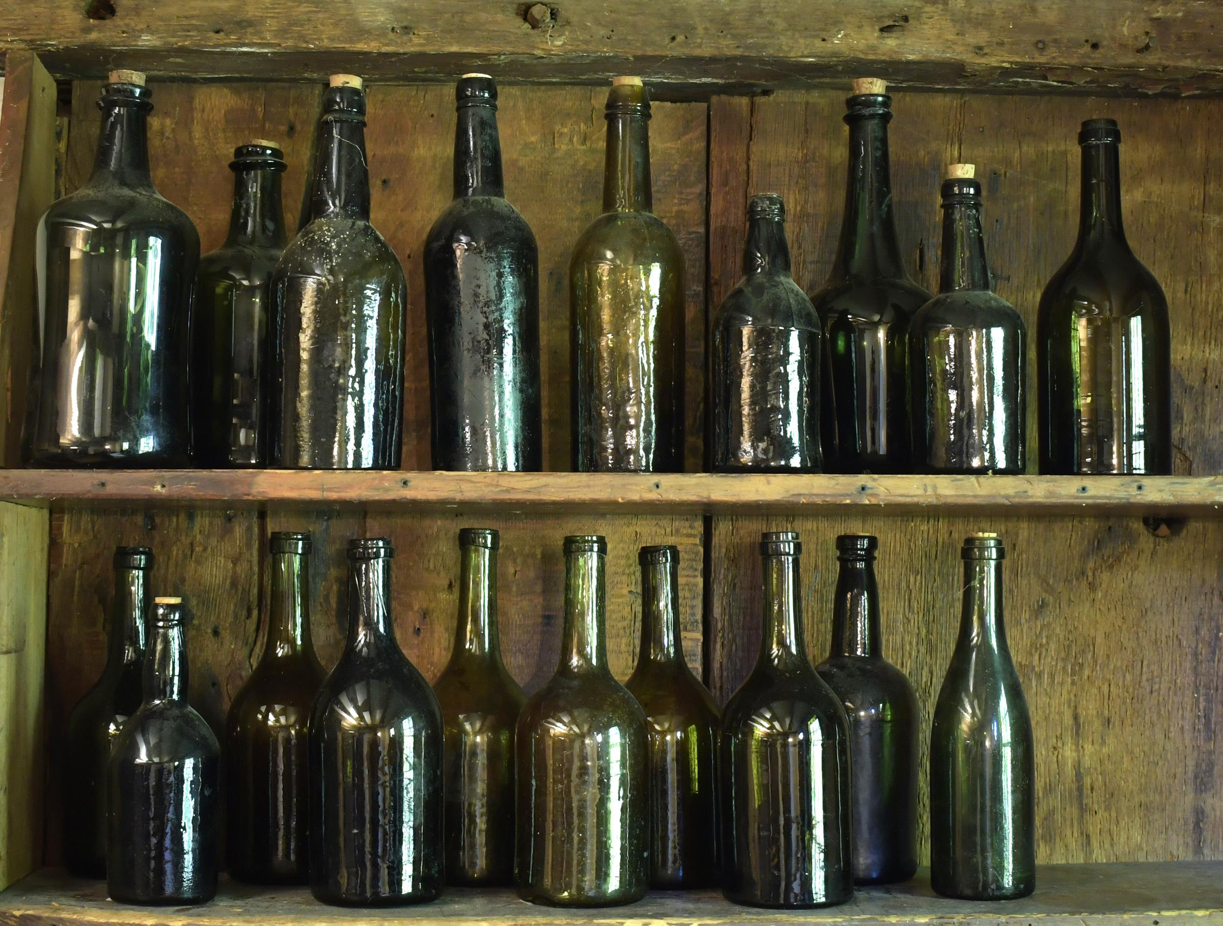 Appraisal: TWENTY EARLY GLASS BOTTLES th and th C early glass