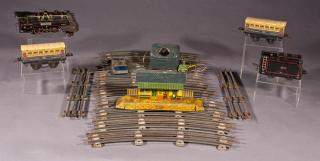 Appraisal: Nineteen Piece French Tin Toy Train Set th c by