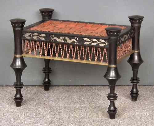 Appraisal: A dark patinated bronze and painted stool in the manner