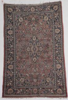 Appraisal: Persian Rug possibly Sarouk medallion and floral patterns on red