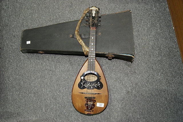 Appraisal: AN ITALIAN MANDOLIN with tortoiseshell and mother of pearl inlay