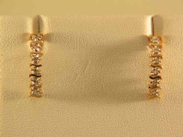 Appraisal: Diamond Earrings curved style with diamonds in each carat total