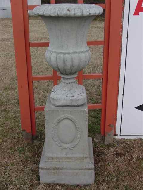 Appraisal: TWO CAST STONE URNS ON STANDS h w d in