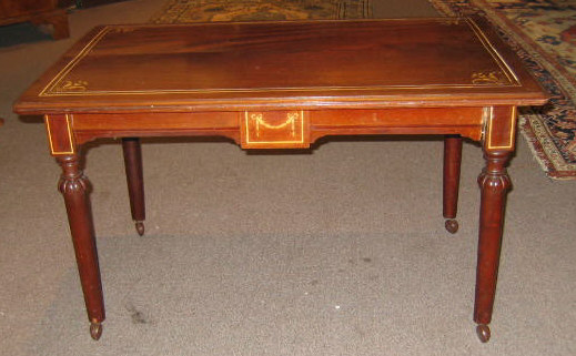 Appraisal: CONTINENTAL MAHOHANY AND INLAID COFFEE TABLE Rectangular top with foliate