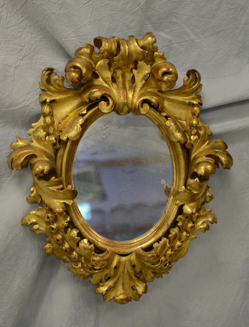 Appraisal: Oval Gilt Rococco Frame with Mirror th Century x x