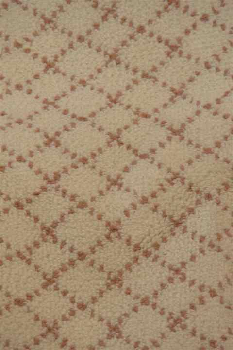 Appraisal: STARK STYLE ROSE AND CREAM LARGE LATTICE PATTERNED CARPET BOUND