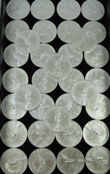 Appraisal: A COLLECTION OF THIRTY-EIGHT MEXICAN SILVER LIBERTADS troy ounce size