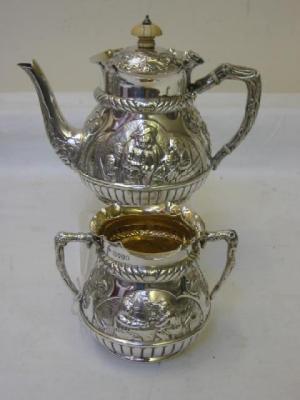 Appraisal: A VICTORIAN BACHELORS TEAPOT AND SUGAR BOWL of tapering form