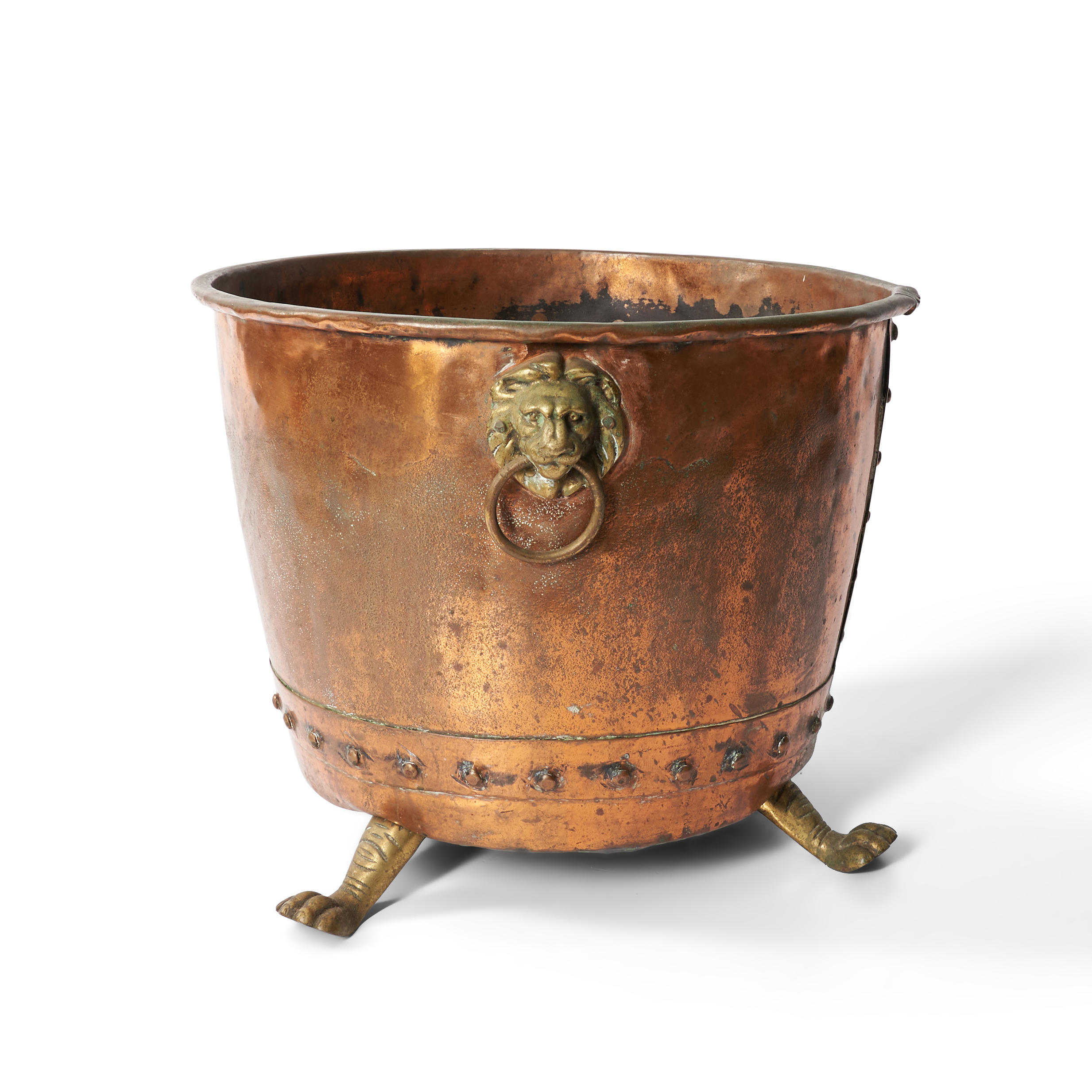 Appraisal: COPPER FOOTED BUCKET with brass lion-form ears on claw feet