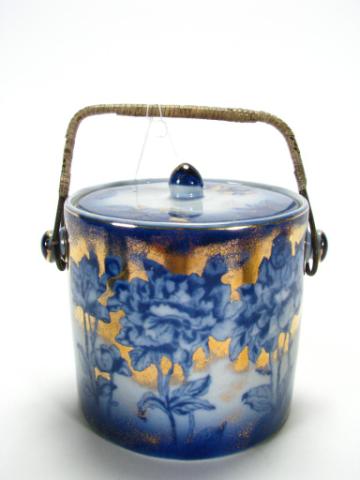 Appraisal: Staffordshire Flow Blue Biscuit Jar with wicker wrapped handle ''