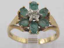 Appraisal: A hallmarked ct gold diamond and emerald ring