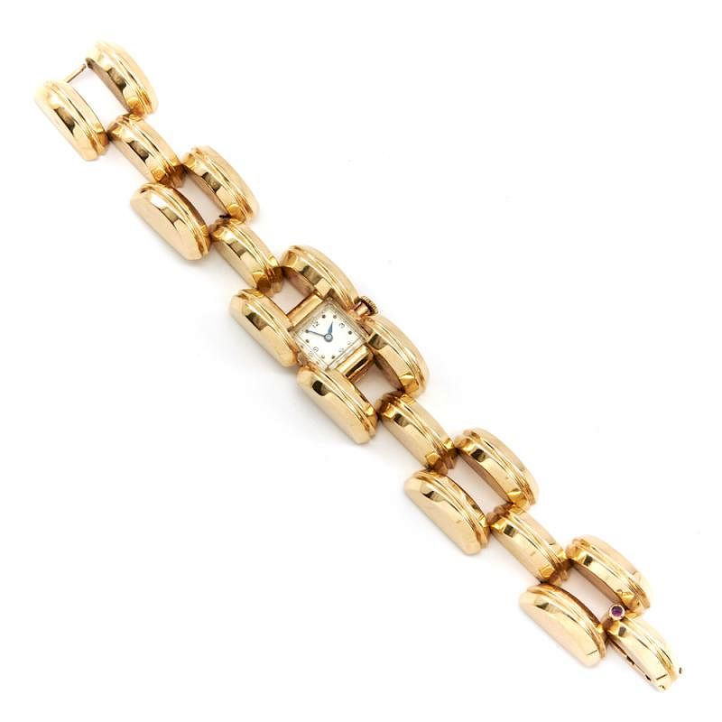 Appraisal: k Yellow gold ladies tank-track style bracelet wristwatch k Yellow