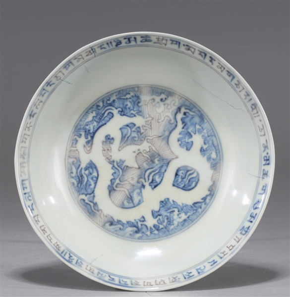 Appraisal: Imperial Chinese blue and white porcelain dragon dish the exterior