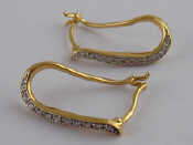 Appraisal: A pair of yellow metal tests carat gold diamond earrings