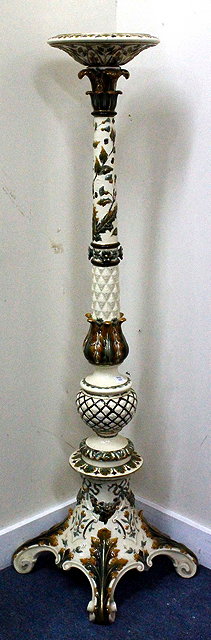 Appraisal: AN OLD POTTERY TORCHERE moulded with acanthus leaves and further