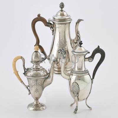 Appraisal: THREE SILVER COFFEE POTS TH- TH C Pear-shaped example with