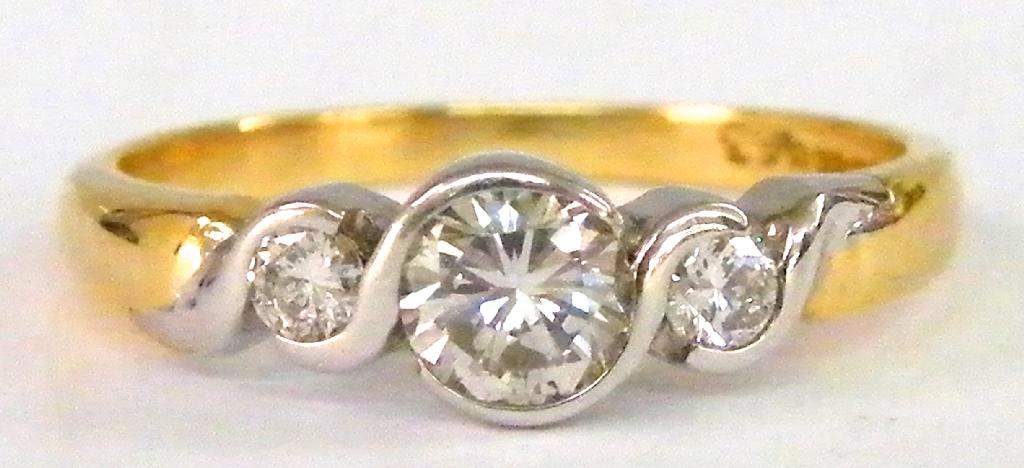 Appraisal: ct diamond three stone two colour ring in an S