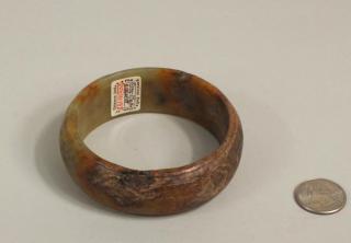 Appraisal: Chinese Song Style Carved Jade Bangle Chinese Song style carved