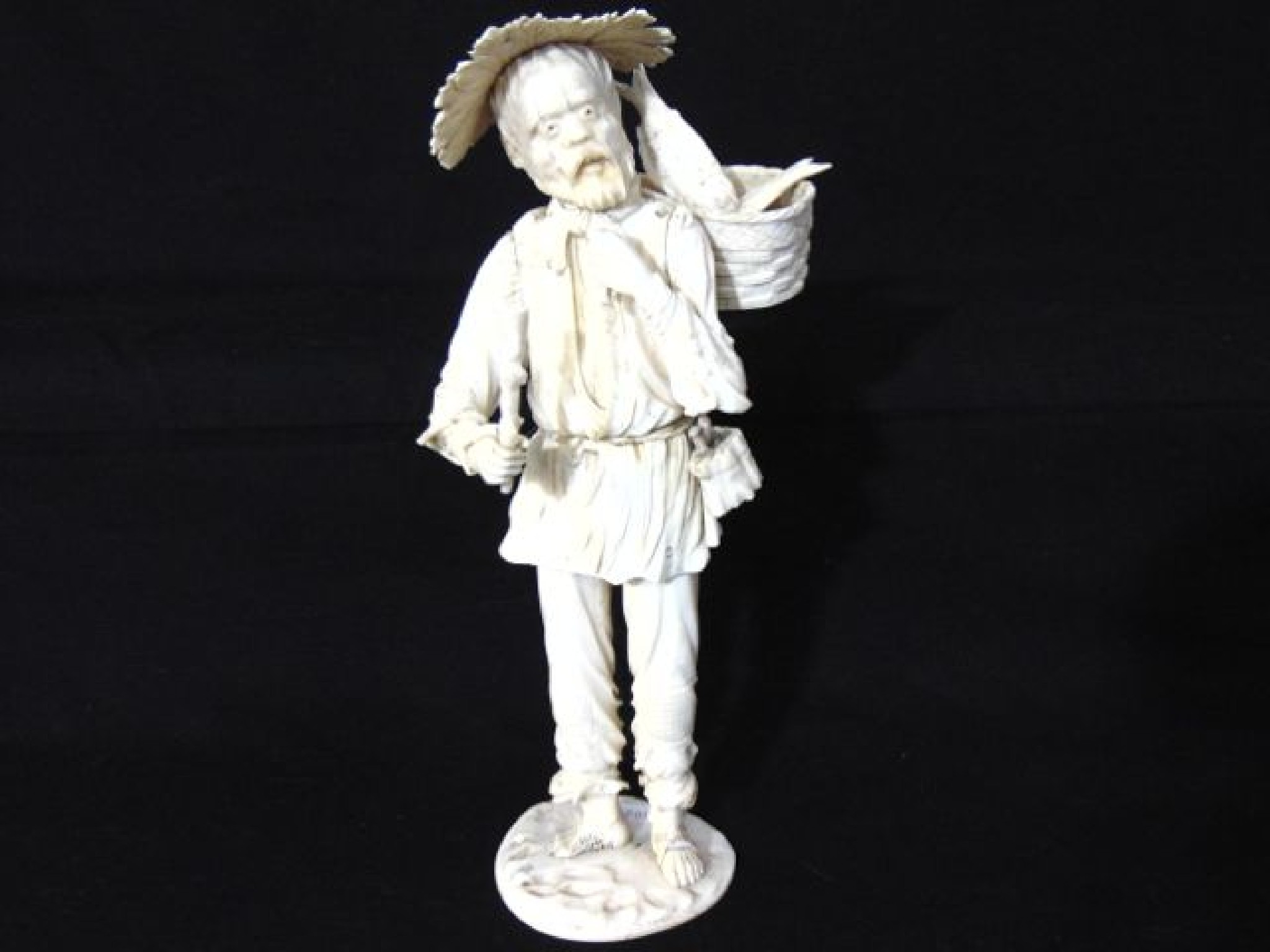 Appraisal: A th century Chinese figure in ivory and bone of