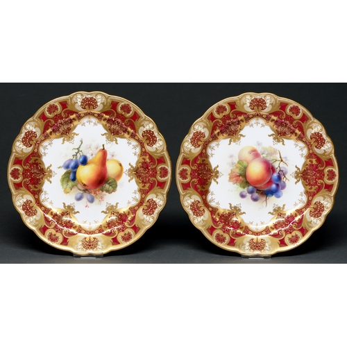 Appraisal: A pair of Royal Worcester dessert plates painted by F