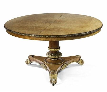 Appraisal: A Victorian amboyna and carved giltwood breakfast table By T