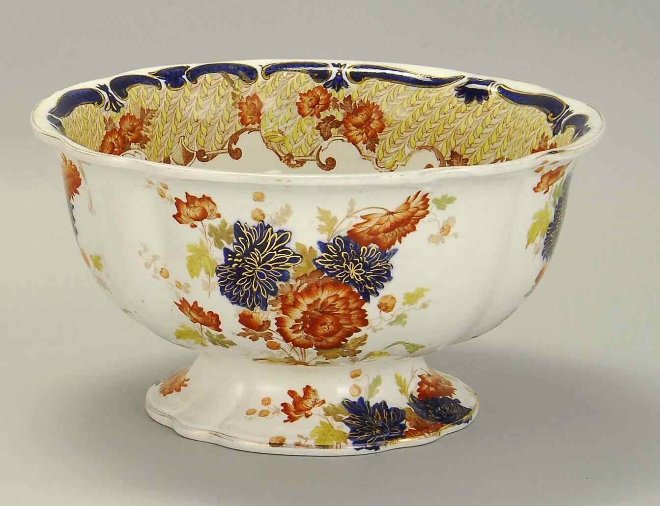 Appraisal: ENGLISH CHINA PUNCH BOWLMid- th CenturyBold proportions with scalloped top