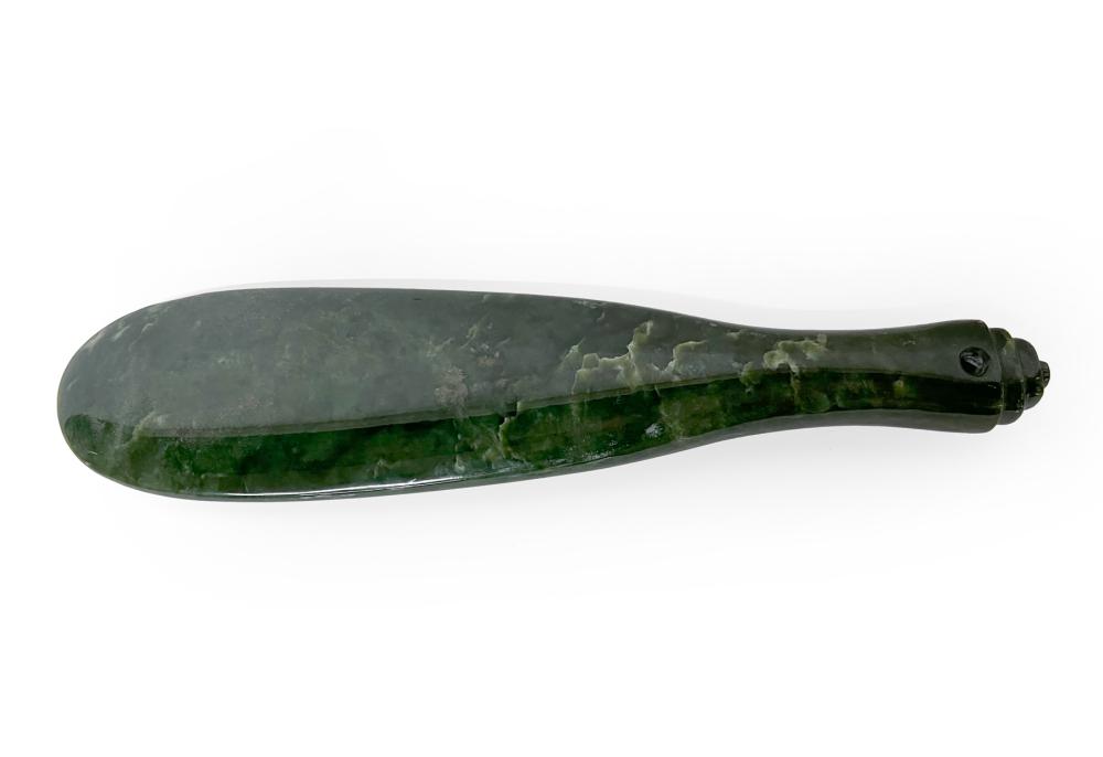 Appraisal: OCEANIC HARDSTONE OR SERPENTINE PADDLE OR CLUBOceanic Hardstone or Serpentine